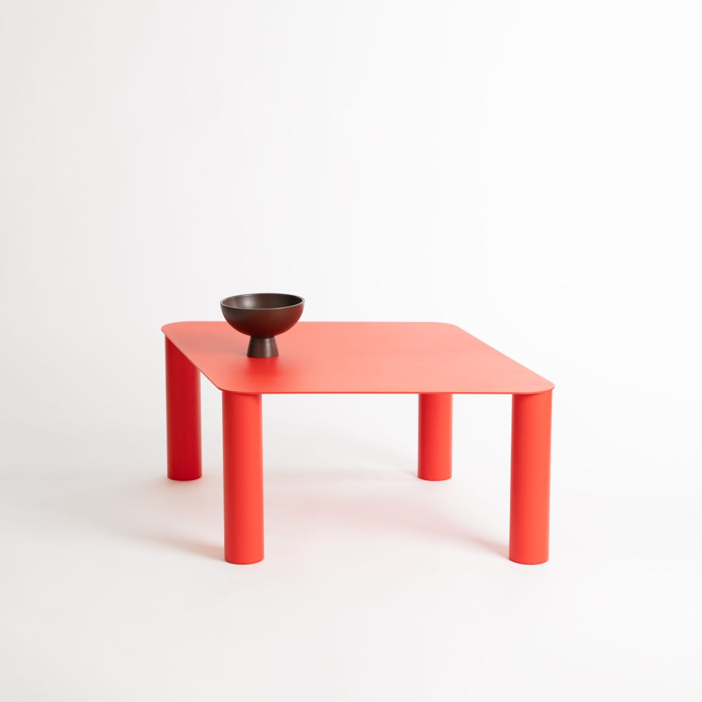 Red Coffee Table - Sculpted Four-Leg Rounded Form